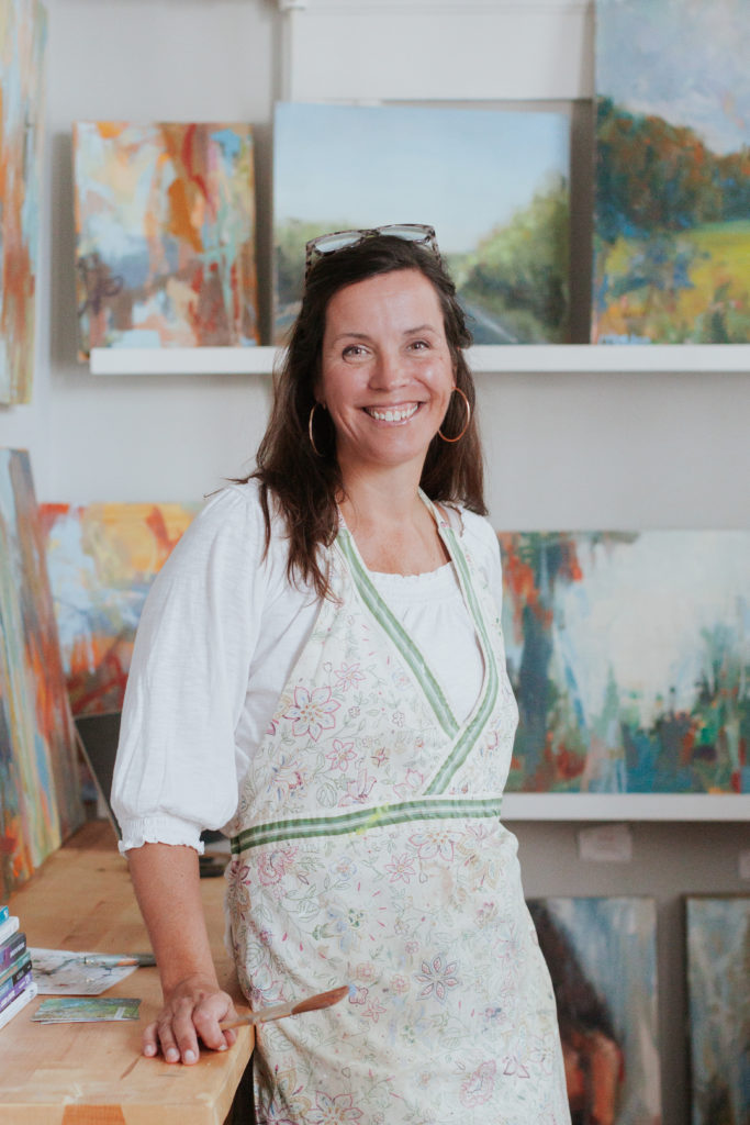 Headshot of artist Christine Dryden in her studio at StudioWorks in Dilworth Neighborhood of Charlotte, NC by Harmonie House Images