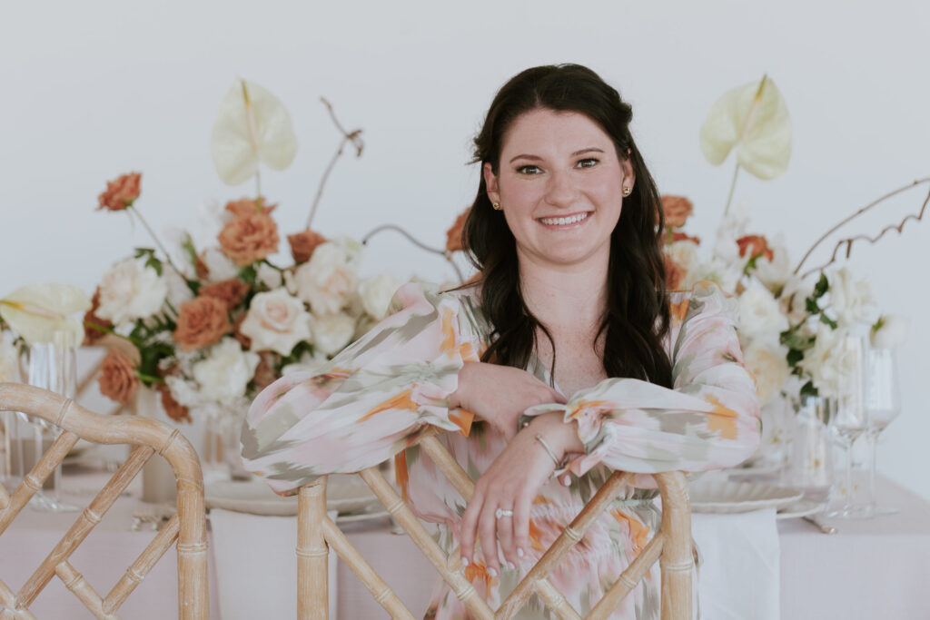 event-planner-headshot-with-florals-the-frame-charlotte