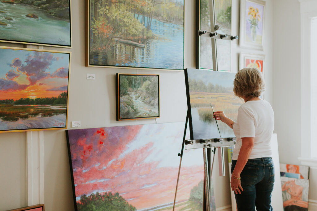 Artist painting in studio