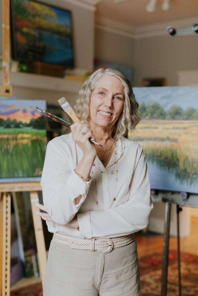 Headshot of an artist in her studio