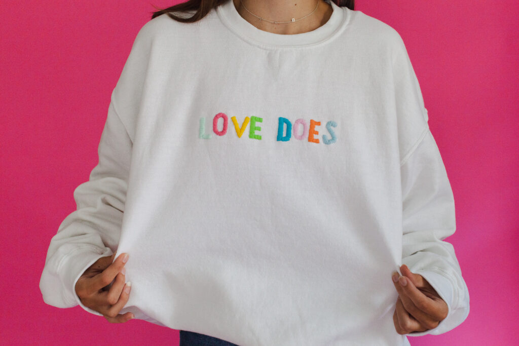 embroidery-brand-photo-sweatshirt-pink-background-love-does-myers-park-Charlotte