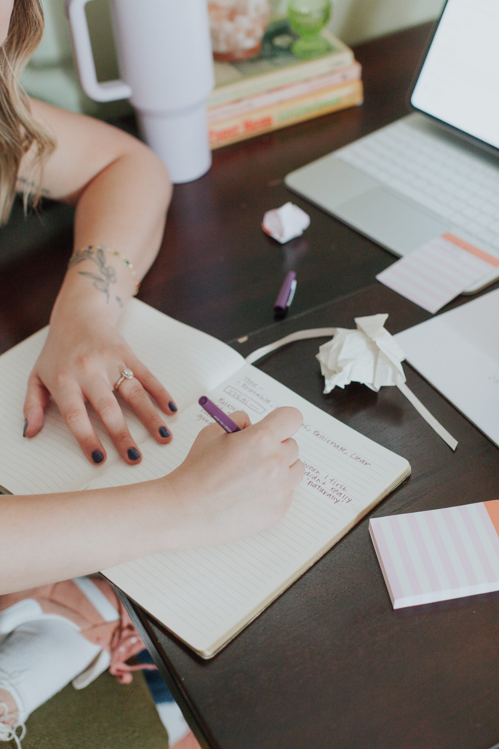 woman writing copy for social media