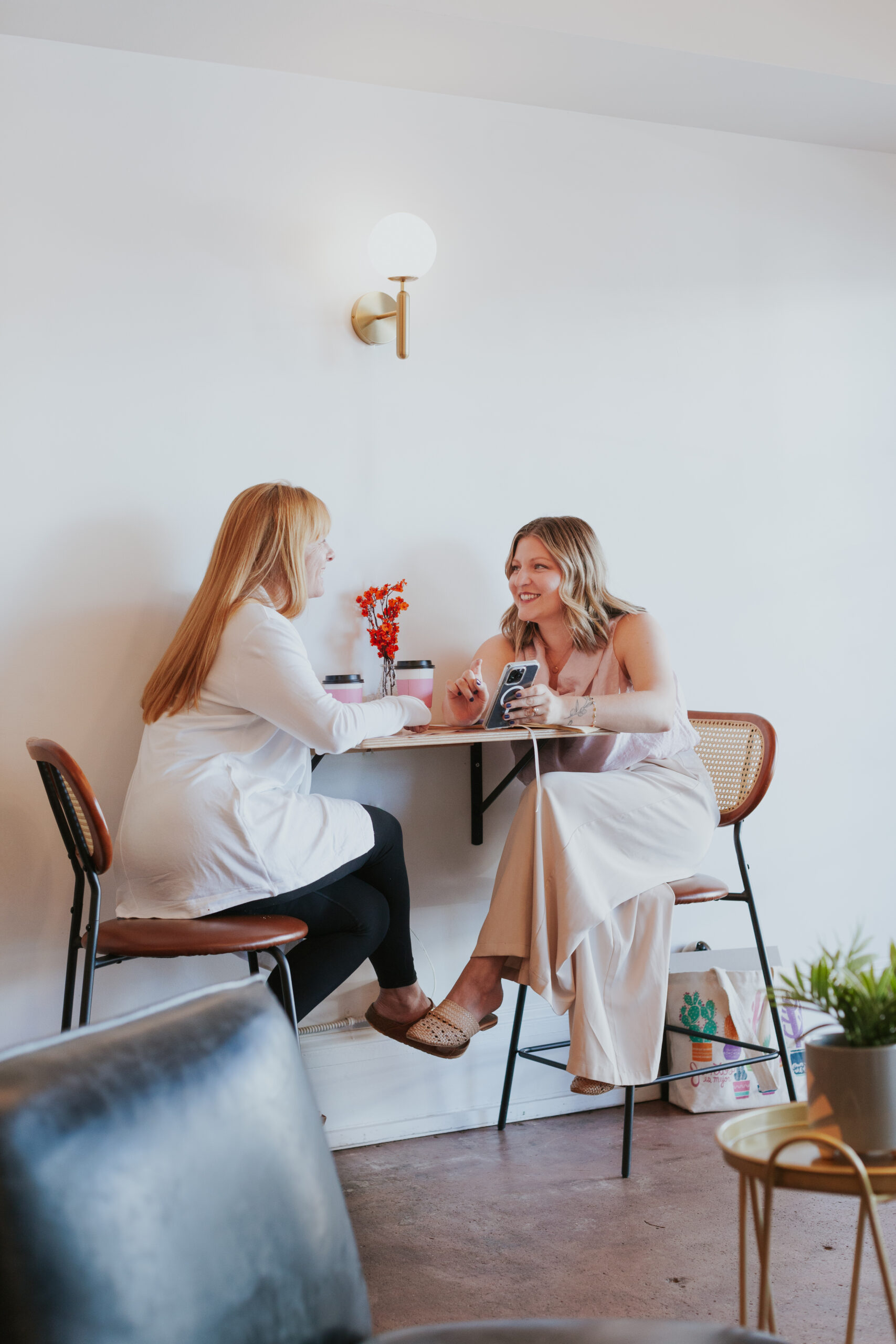 women having a business meeting at coffee shop